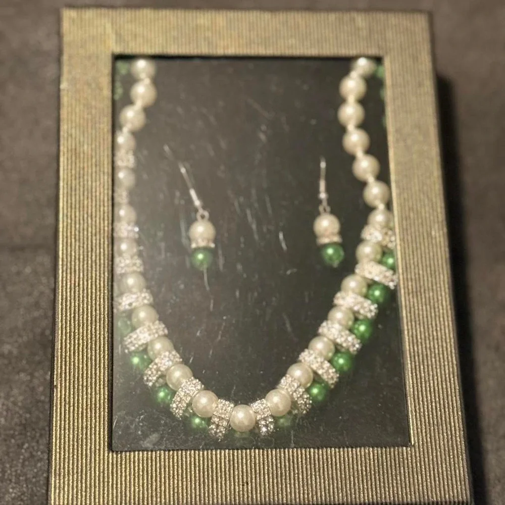 Green and white pearl necklace and earring set with rhinestones